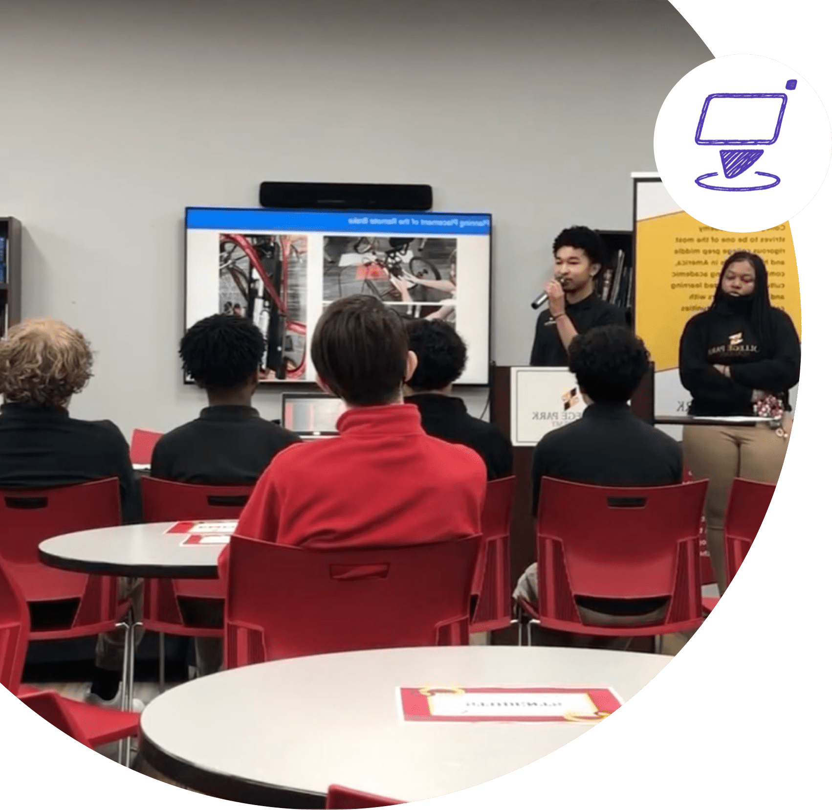 Students presenting in front of their class